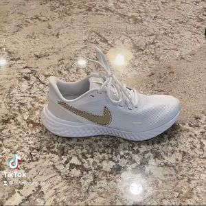 Nike blinged tennis shoes.